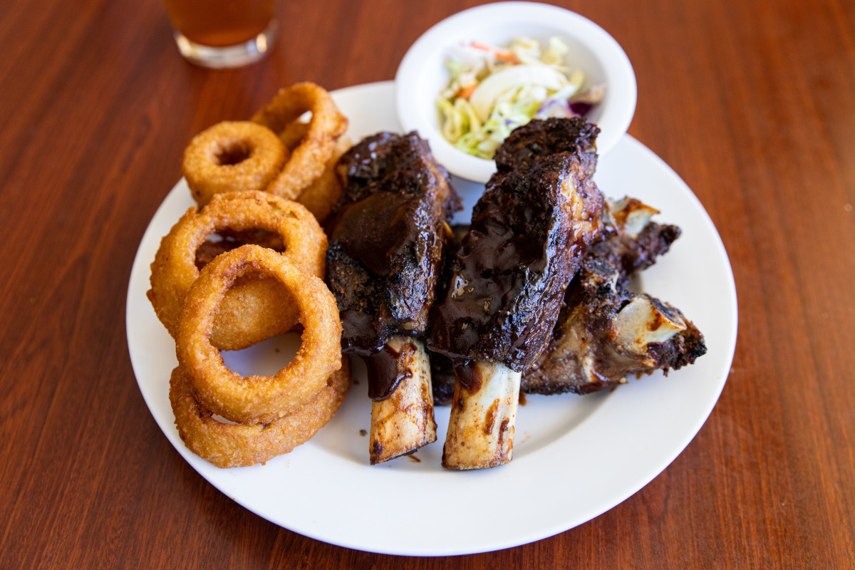 Grilled meat, onion rings on the side