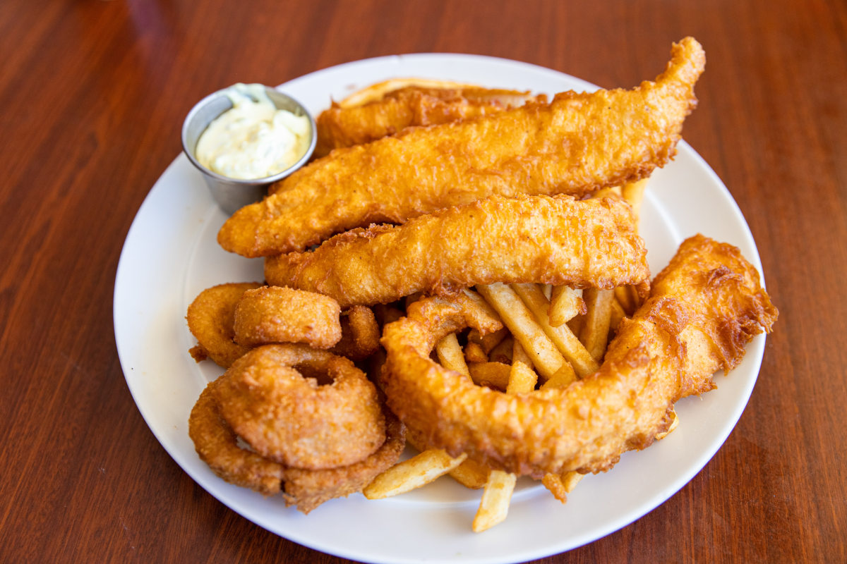 Onion rings and nuggets, fries on the side